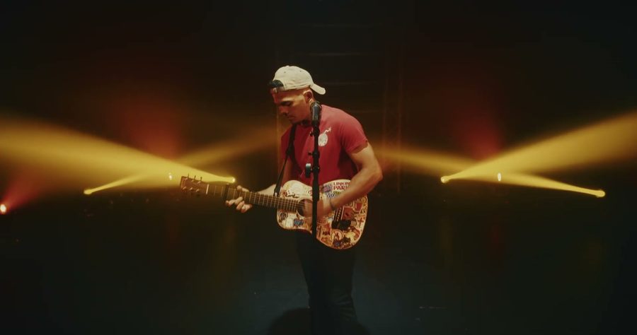 Trevor James on stage under the lights